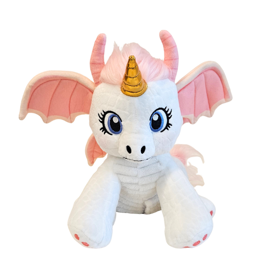 Plüsch-Einhorn mit goldener Krone, rosa Flügeln und hellblauem Körper, große Augen.