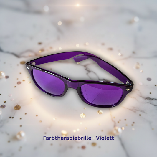 Farbtherapiebrille mit violetten Linsen, dunklem Rahmen und seitlichen Bügeln