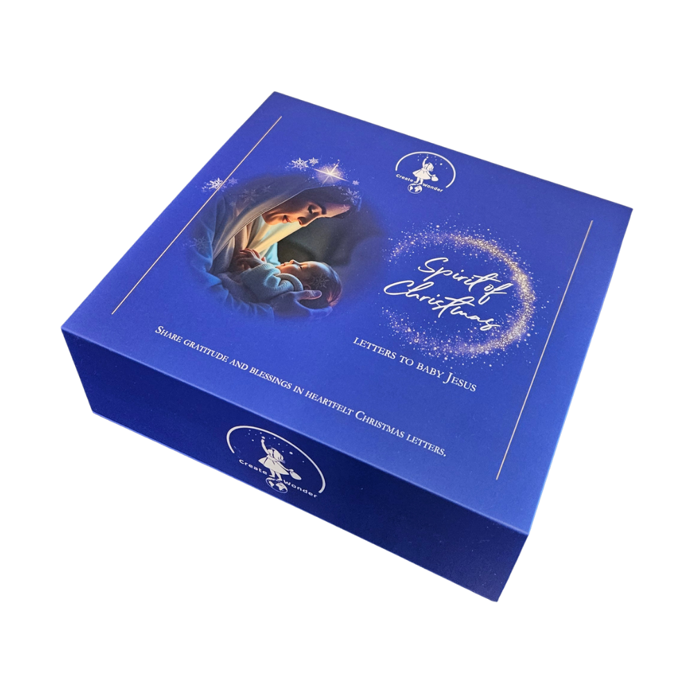 Dunkelblaue Geschenkbox mit Krippenmotiv, Schriftzug und Sternenverlauf