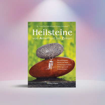 Buchcover mit Stapel grauer Steine und Anhänger, Titel „Heilsteine“ von Amethyst bis Zirkon