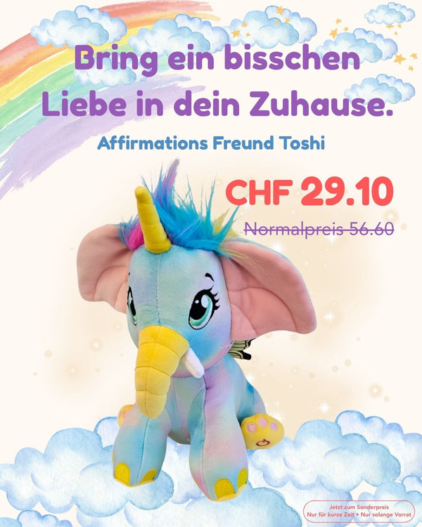 Blaues Einhorn-Plüschtier mit gelbem Horn und Flügeln, stehend auf weichen Wolken